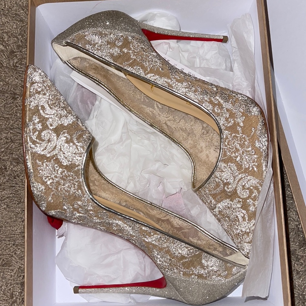 CHRISTIAN LOUBOUTIN